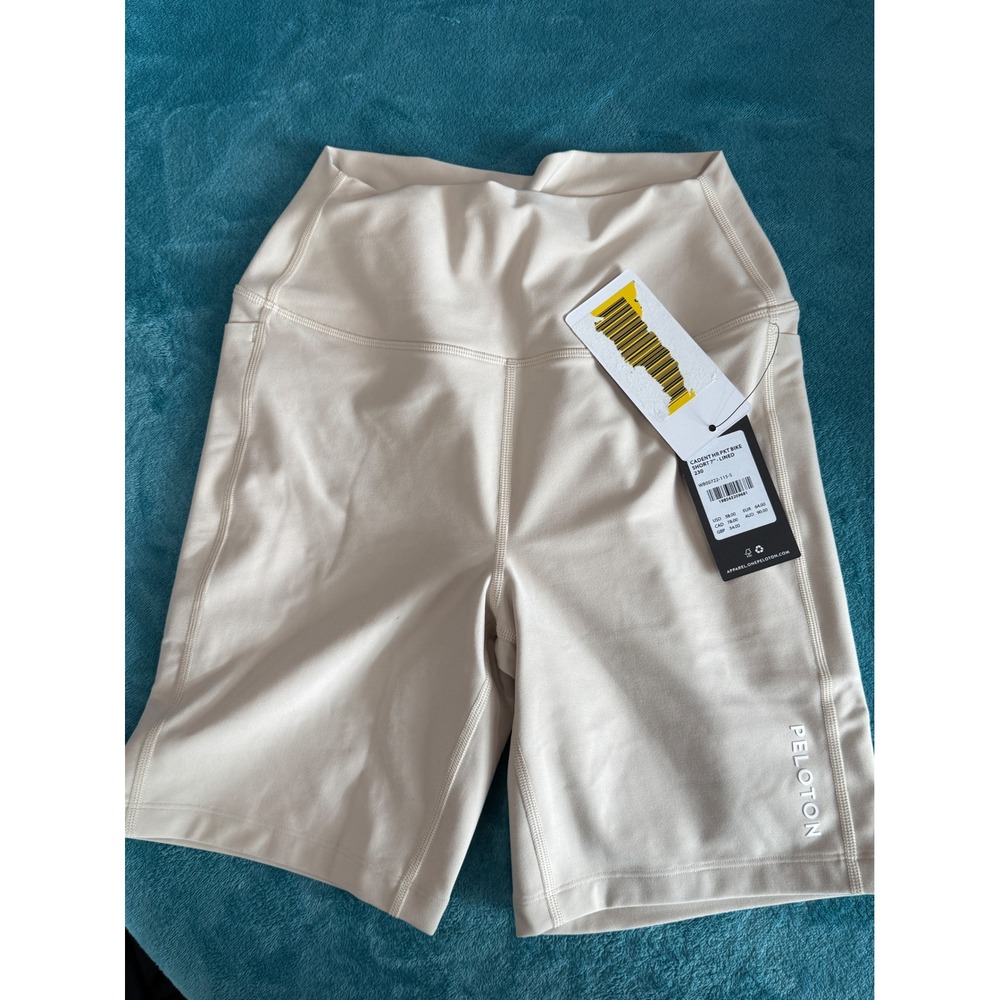 Peloton Cadent High Rise Pocket Bike Shorts 7 Lined Sand‎ Cream WB00722-115-S S